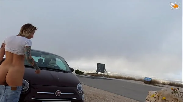 Crazy couple fucks on top of the mountain and cum on rented car