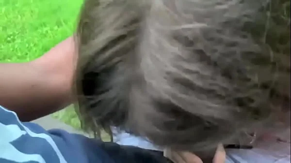Dyke sucks sloppy dick on park bench