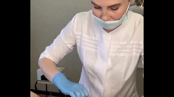 The patient CUM powerfully during the examination procedure in the doctor's hands