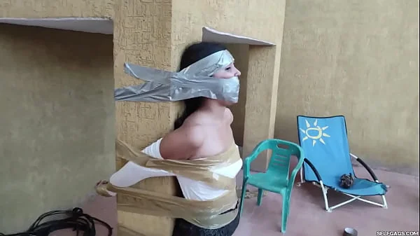 Christian Girl Duct Taped To Pillar And Gagged Tight